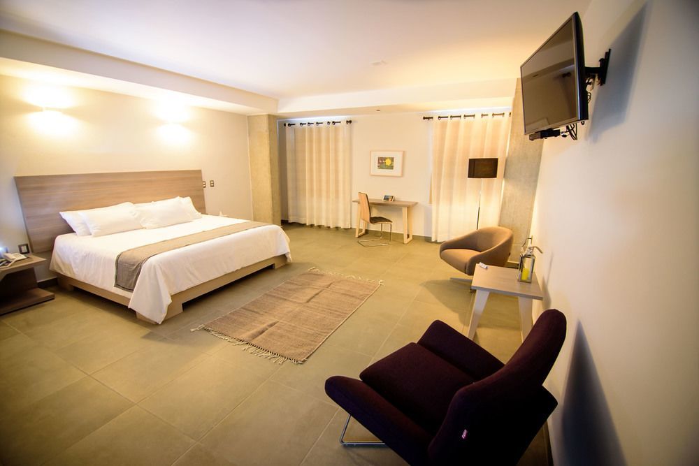 Maria Ines Hotel Suite San Agustin de las Juntas Zewnętrze zdjęcie