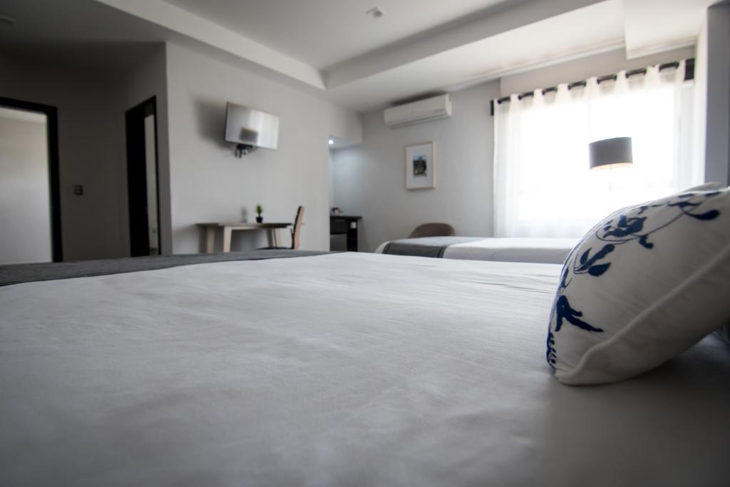 Maria Ines Hotel Suite San Agustin de las Juntas Zewnętrze zdjęcie